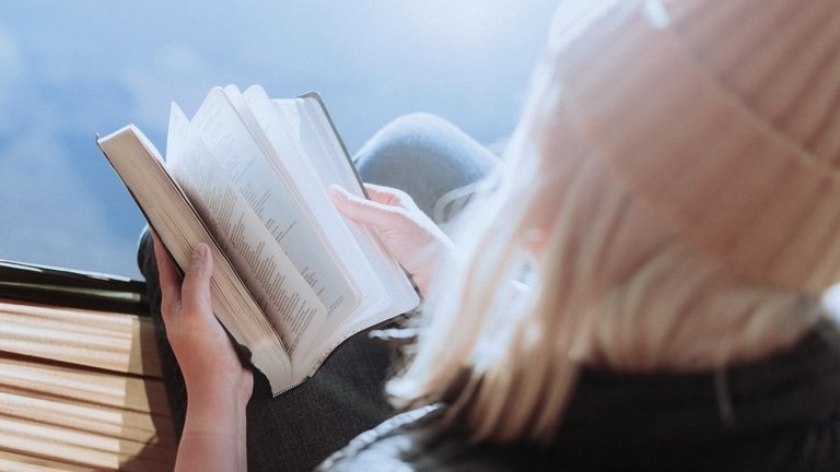 Woman reading Bible