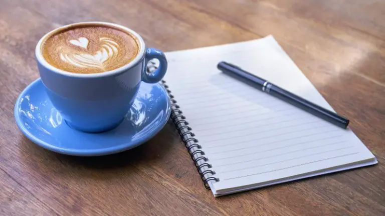 Journal and cup of coffee